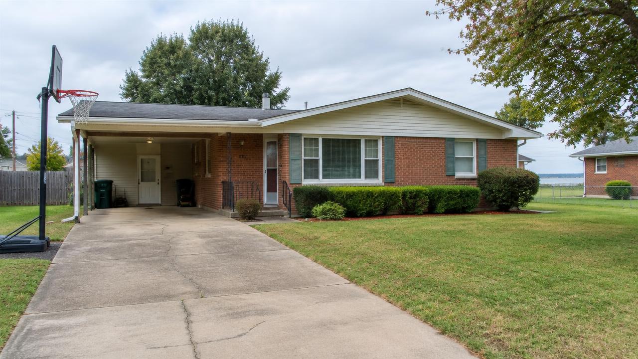 1970s suburban home with a carport and a basketball hoop in Farmington, Hampton, Virginia