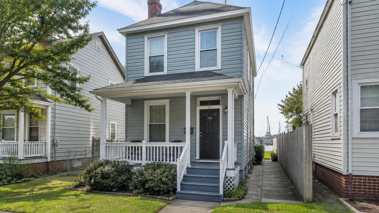Compact two story shipyard era home with a narrow side yard in West Park View, Portsmouth, Virginia
